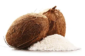 White Background Coconut Drucke: Composition with shredded coconut and shells isolated on white background