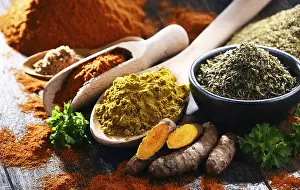 Healthy Eating Composition Drucke: Composition with spices on wooden kitchen table
