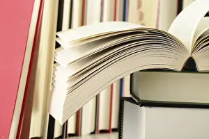 Educational Institution Images Drucke: Composition with stack of books on the table