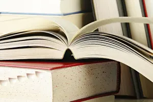 Educational Institution Images Drucke: Composition with stack of books on the table