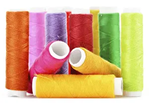 Handicraft Threads Drucke: Composition with tailor needles and threads over white background