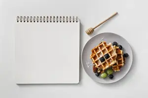 Breakfast Dessert Recipes Drucke: Composition tasty breakfast waffles with empty notebook