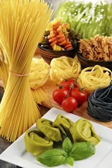 Kitchen Table Setup Drucke: Composition with variety of pasta on kitchen table