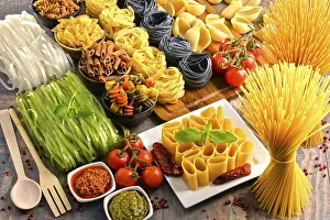 Kitchen Table Setup Drucke: Composition with variety of pasta on kitchen table