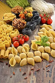 Kitchen Table Setup Drucke: Composition with variety of pasta on kitchen table