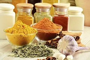 Balanced Diet Essentials Drucke: Composition with variety of spices on kitchen table