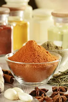 Kitchen Table Setup Drucke: Composition with variety of spices on kitchen table