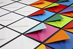White Envelopes On Table Drucke: Composition with white and colored envelopes on the table