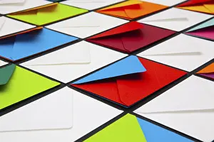 Glazed Tile Background Drucke: Composition with white and colored envelopes on the table