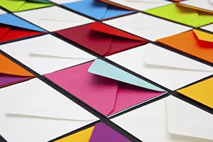Glazed Tile Background Drucke: Composition with white and colored envelopes on the table