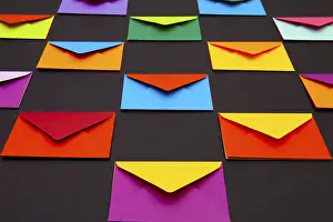 Holiday Table Setting Drucke: Composition with white and colored envelopes on the table