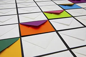 Glazed Tile Background Drucke: Composition with white and colored envelopes on the table