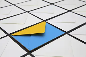 Glazed Tile Background Drucke: Composition with white and colored envelopes on the table