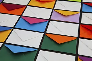 Colorful Envelopes Drucke: Composition with white and colored envelopes on the table