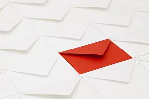 Empty Office Desk Setup Drucke: Composition with white envelopes and one red envelope on the table