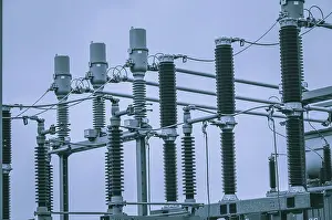 Electricity Supply System Drucke: Concept of electricity and power generation using the example of insulators and devices in a substation