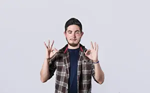 Positive Body Language Drucke: Concept of no problem, young man making ok gesture