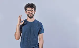 Positive Body Language Drucke: Concept of no problem, young man making ok gesture