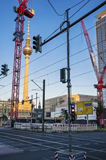 Television Tower Germany Drucke: Construction cranes in front of television tower