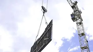 Urban Construction Site Drucke: Construction of a modern building and a skyscraper