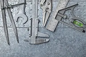 Metallic Background Drucke: Construction Tools Composed On Metallic Background
