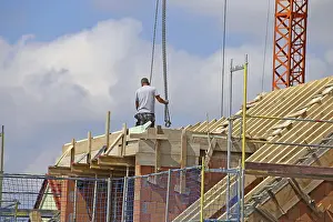 New Construction Site Drucke: Construction worker (bricklayer) on the building site (Mutterstadt development area)