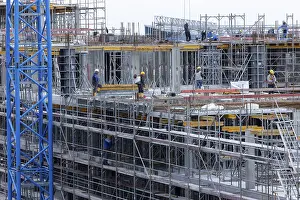 German Construction Site Drucke: Construction worker on a large building site