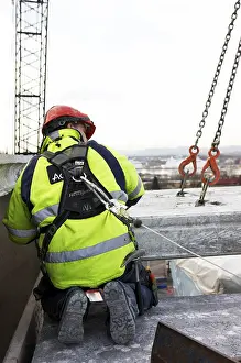 Construction Worker Drucke: Construction worker working outside building