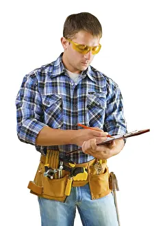 Construction Worker Drucke: Construction worker writing in paperclip