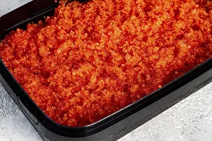 Fresh Seafood Market Drucke: Container with orange caviar, flying fish