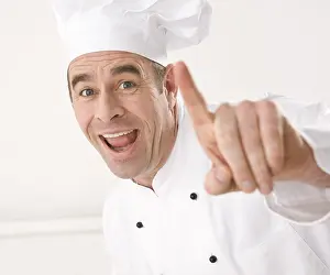 Studio Shot Of A Cook Drucke: Cook gesticulating, laughing