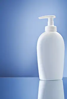 Cleanliness And Hygiene Products Drucke: Copy space bottle on blue