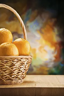 Deserted Wooden Table Setup Drucke: Copy space oranges in wicker bast