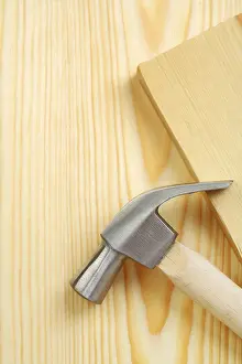 Wooden Board Repair Tools Drucke: Copyspace hammer on timber