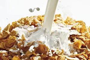 Top Down View Of Breakfast Drucke: Cornflakes with milk