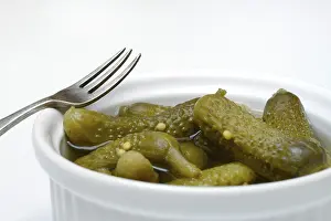 Pickled Vegetables Drucke: Cornichons in bowl with fork, Germany