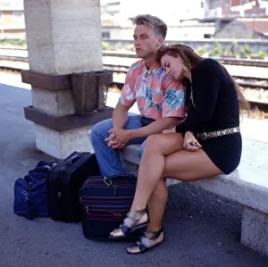 Means Of Transportation Images Drucke: Couple waiting for train