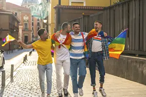Urban Pride Celebration Drucke: Couples of men smiling at the demonstration with the rainbow flags