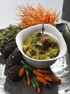 Studio Shot Of Food Drucke: Couscous with dates