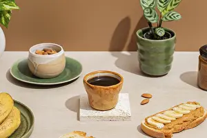 Fresh Fruit Arrangement Drucke: A cozy breakfast setting featuring a cup of coffee
