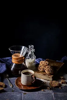 Rustic Coffee Setup Drucke: A cozy setup featuring a rustic ceramic cup of coffee
