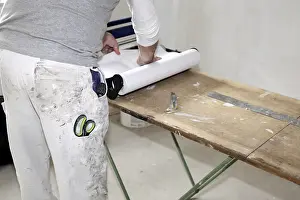 Construction Site Worker Drucke: Craftsman (painter) for wallpapering work