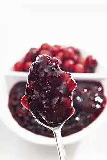 Fruity Food Photography Drucke: Cranberry jam on a spoon