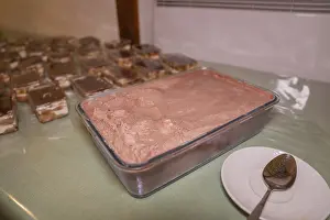 Central Europe Cuisine Drucke: Creamy chocolate dessert in a rectangular glass dish with spoon next to it