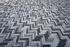 Deserted Cobblestone Street Drucke: Creative structure with paving stones on sidewalk