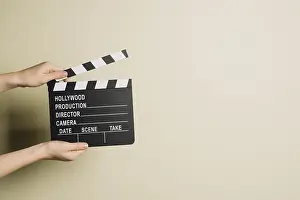 Symbolic Hand Gesture Drucke: Crop hands with clapperboard