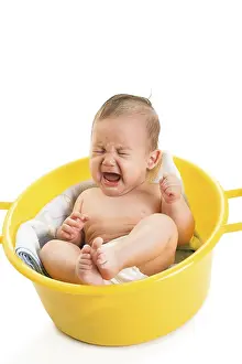 White Background Photo Drucke: Crying boy isolated on white
