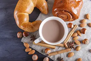 Studio Shot Of Coffee Cup Drucke: A cup of hot chocolate with nuts