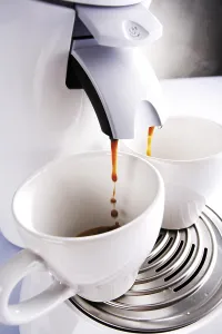 Coffee Machine Drucke: Two cups under a coffee machine