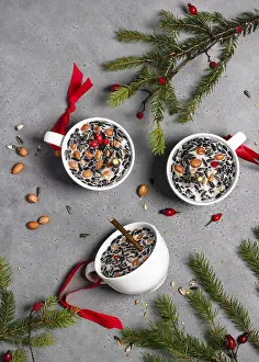 Handicraft Production Drucke: Three cups filled with nuts and seeds